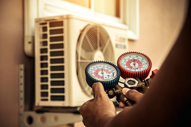 Professional Heat Pump Repair technician working in Colgate, WI